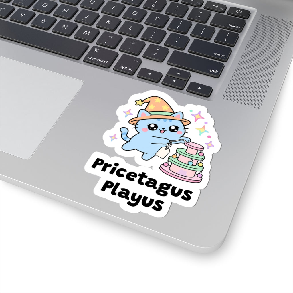 Pricetagus Playus wizard cat sticker stuck on a silver laptop next to the keyboard