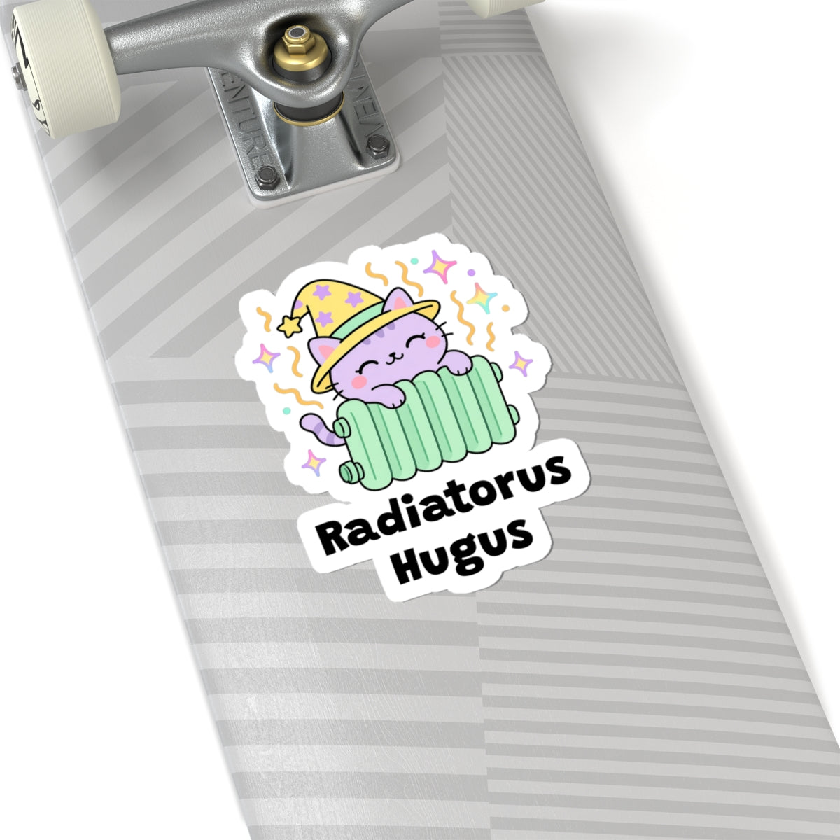 Radiatorus Hugus wizard cat sticker on a grey skateboard deck near the truck