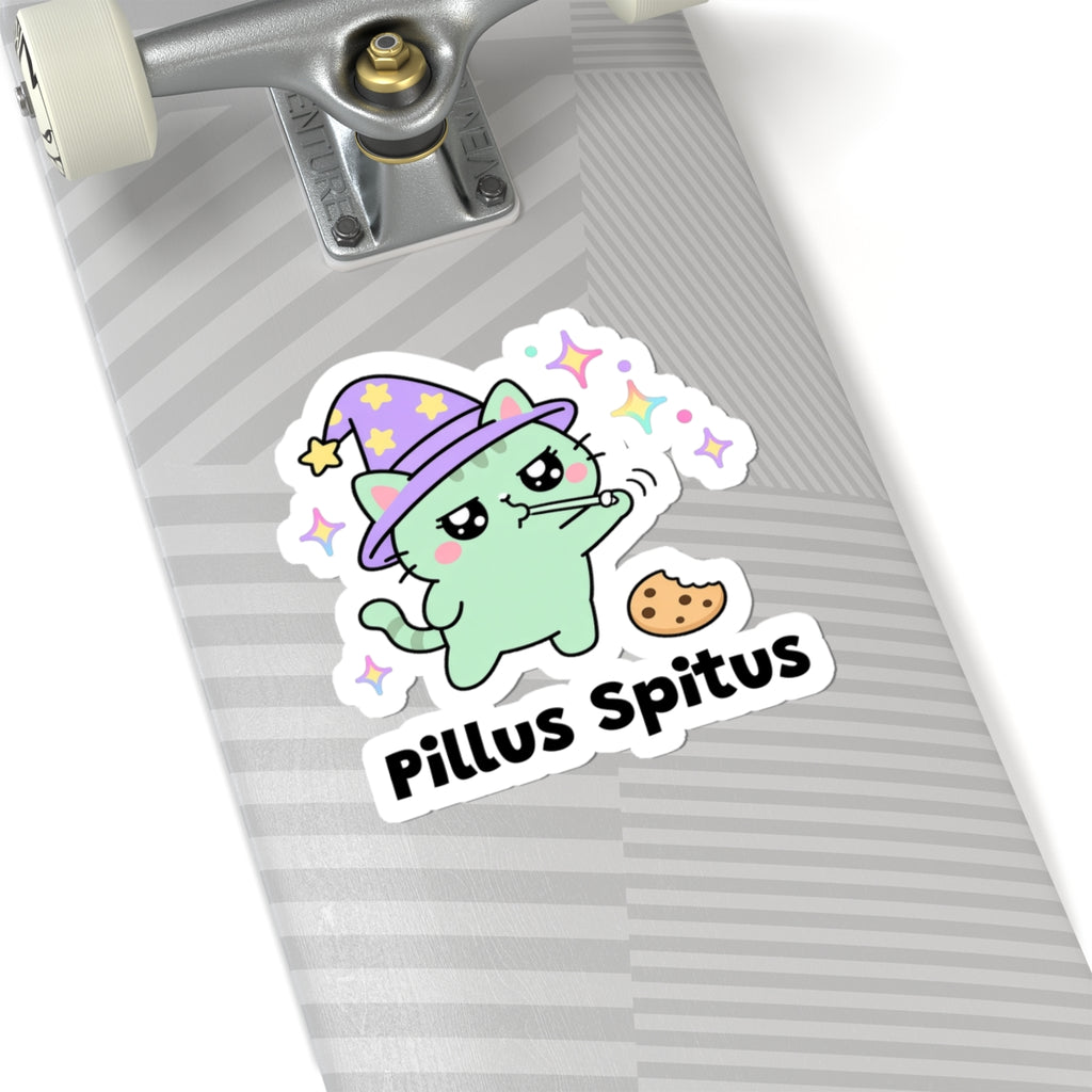 Pillus Spitus wizard cat sticker on a grey skateboard deck near the truck