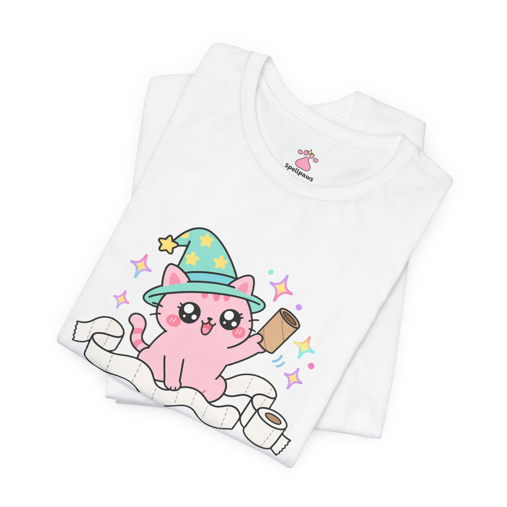 Folded white Toiletus Paperus Unrollus T-shirt showing a close-up of the pink wizard cat in a mint star hat holding an empty cardboard roll, surrounded by unrolled toilet paper