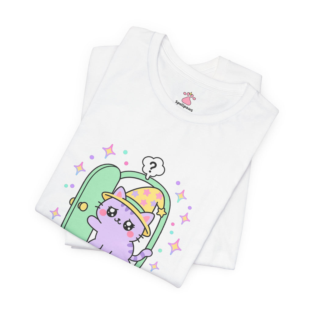 Folded white Doorus Indecisus T-shirt showing a close-up of the lilac wizard cat in a yellow hat standing in an open green doorway with a question mark