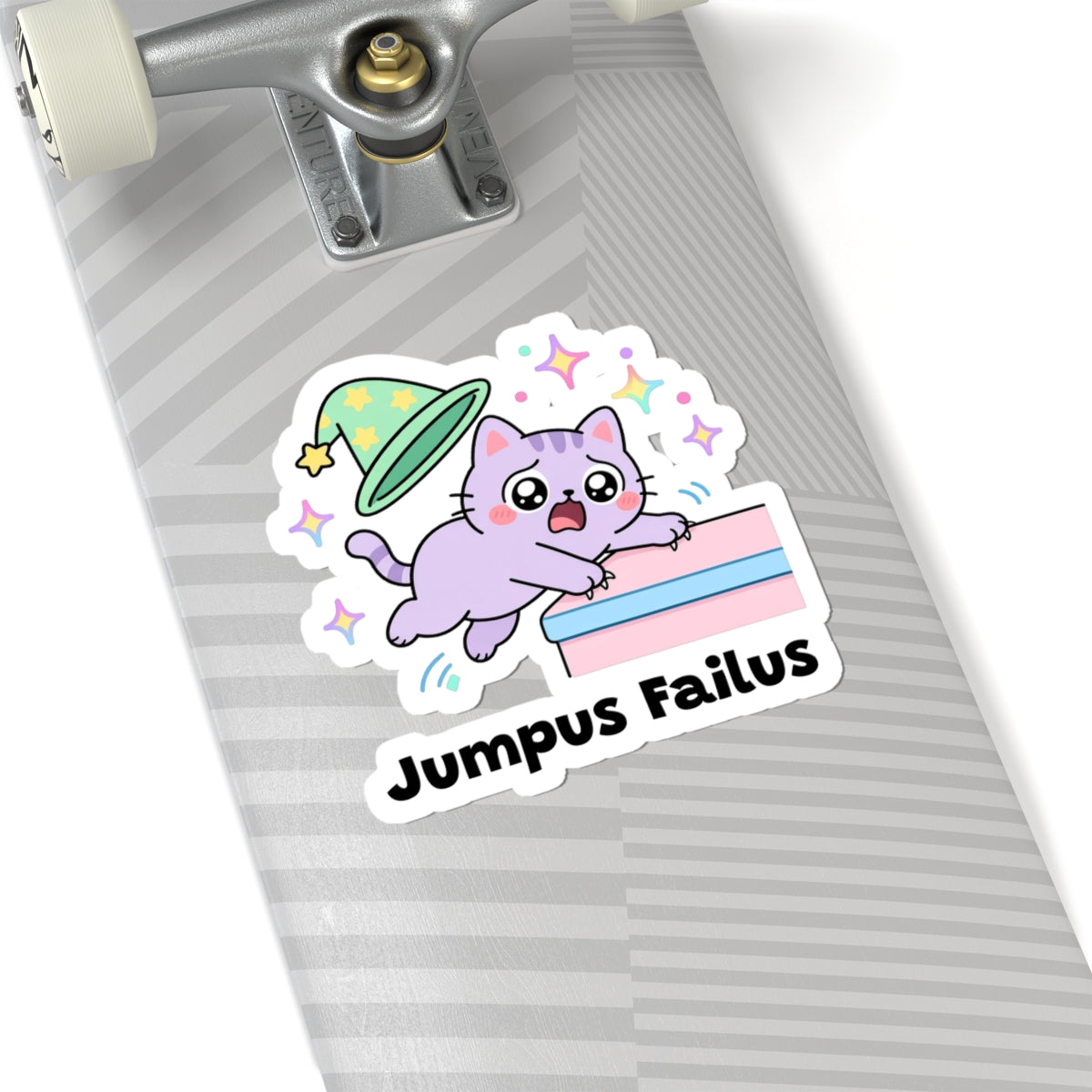 Jumpus Failus wizard cat sticker on a grey skateboard deck near the truck