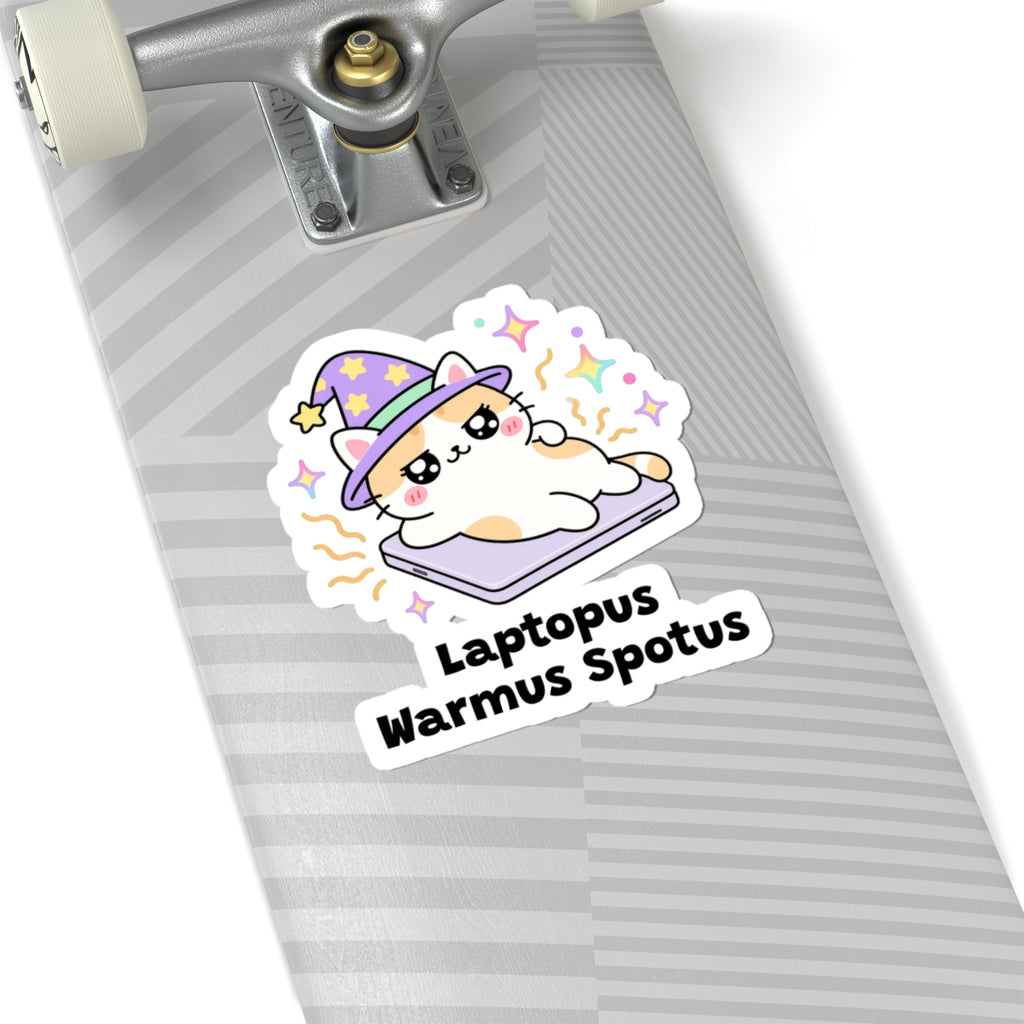 Laptopus Warmus Spotus wizard cat sticker on a grey skateboard deck near the truck