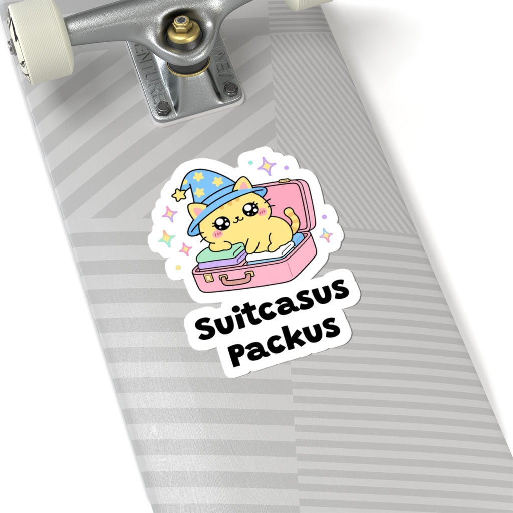 Suitcasus Packus wizard cat sticker on a grey skateboard deck near the truck