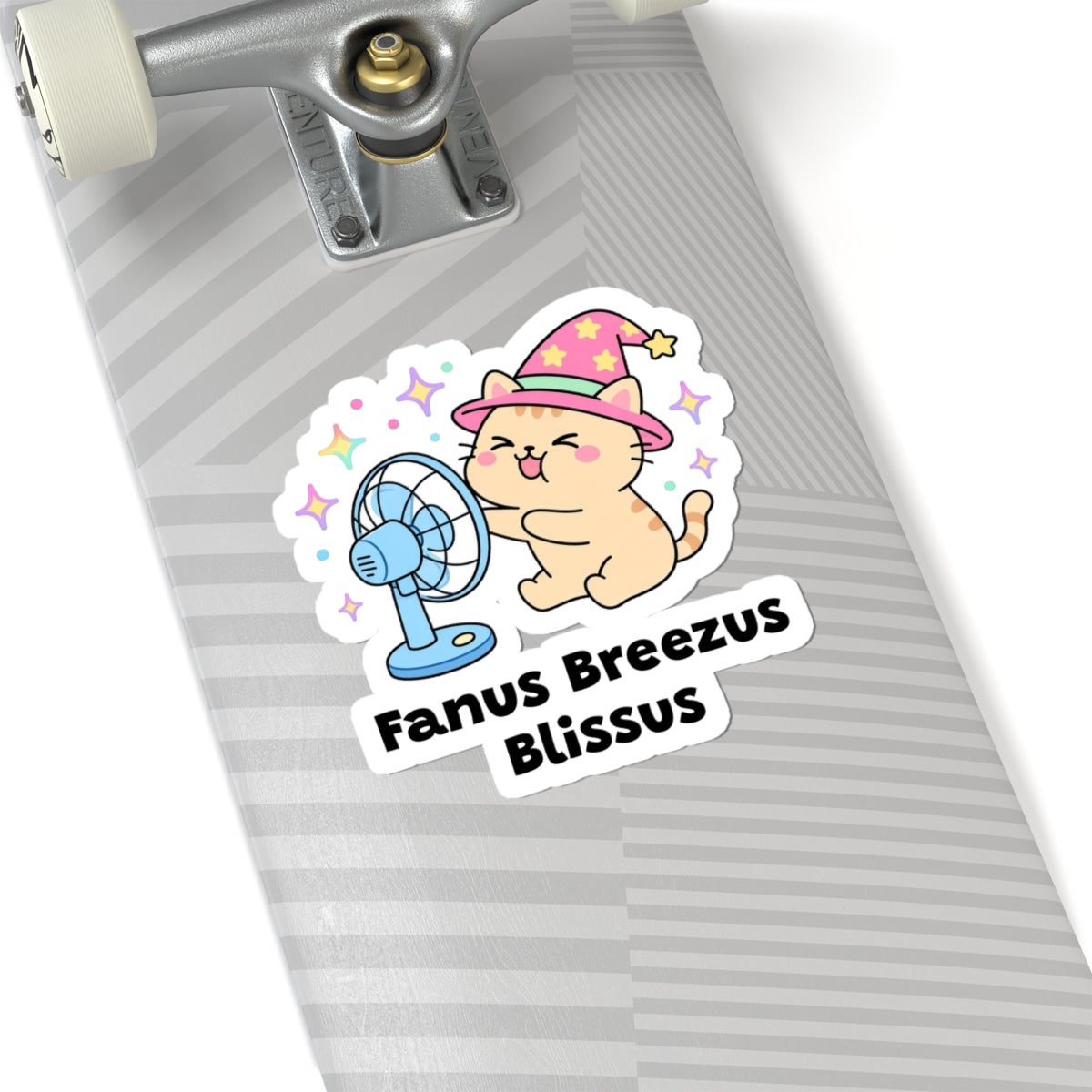 Fanus Breezus Blissus wizard cat sticker on a grey skateboard deck near the truck