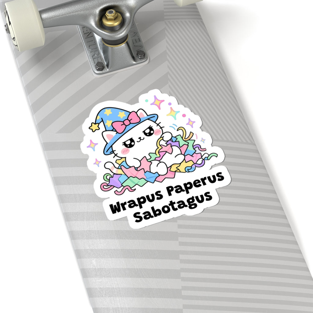 Wrapus Paperus Sabotagus wizard cat sticker on a grey skateboard deck near the truck