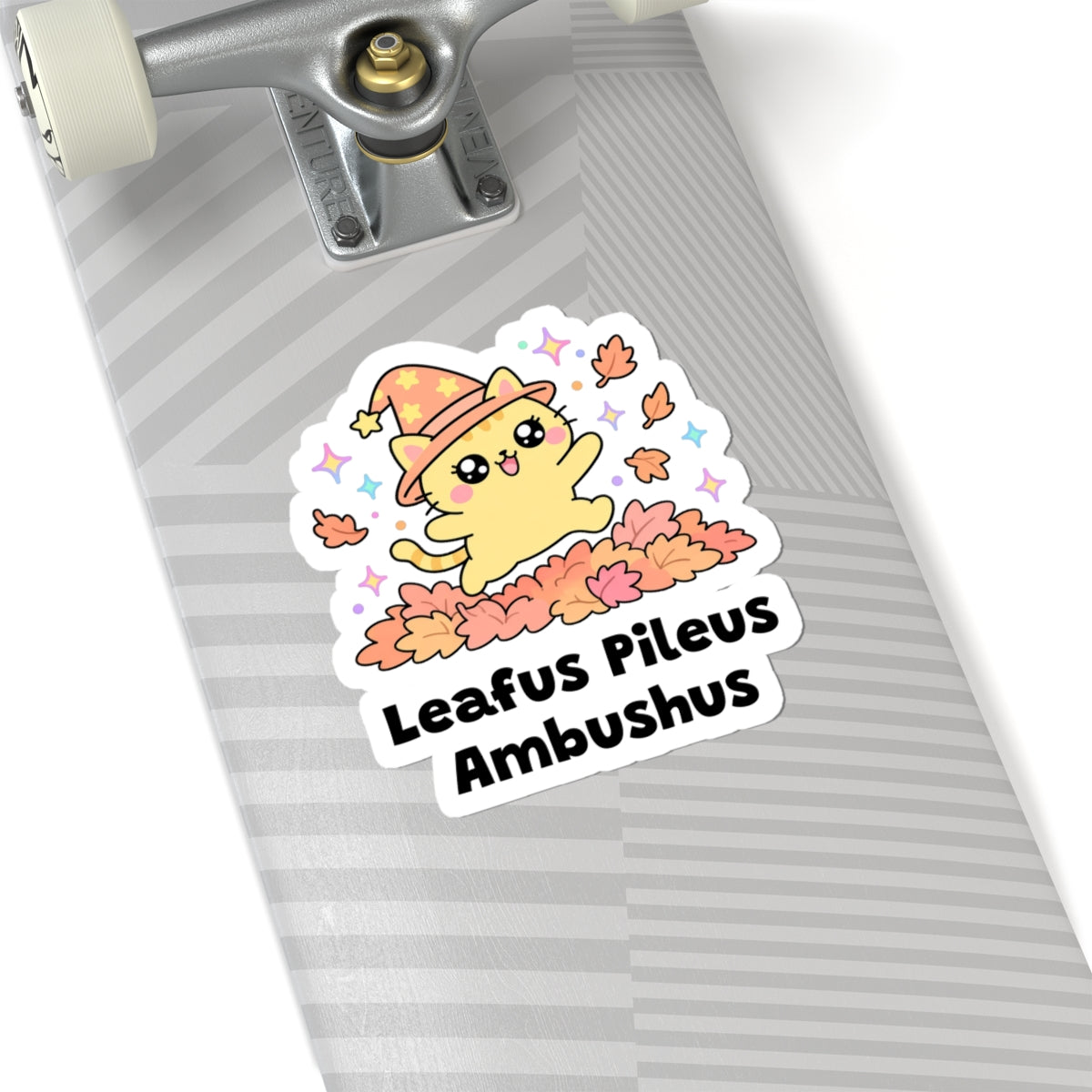 Leafus Pileus Ambushus wizard cat sticker on a grey skateboard deck near the truck