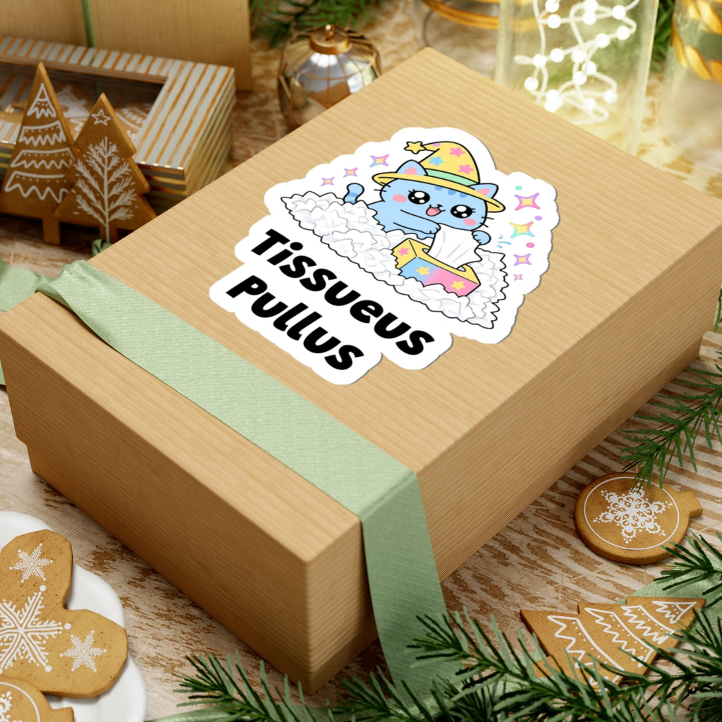 Tissueus Pullus wizard cat sticker on a kraft gift box with a green ribbon and holiday cookies