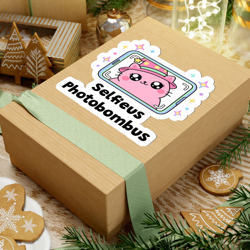 Selfieus Photobombus wizard cat sticker on a kraft gift box with a green ribbon and holiday cookies