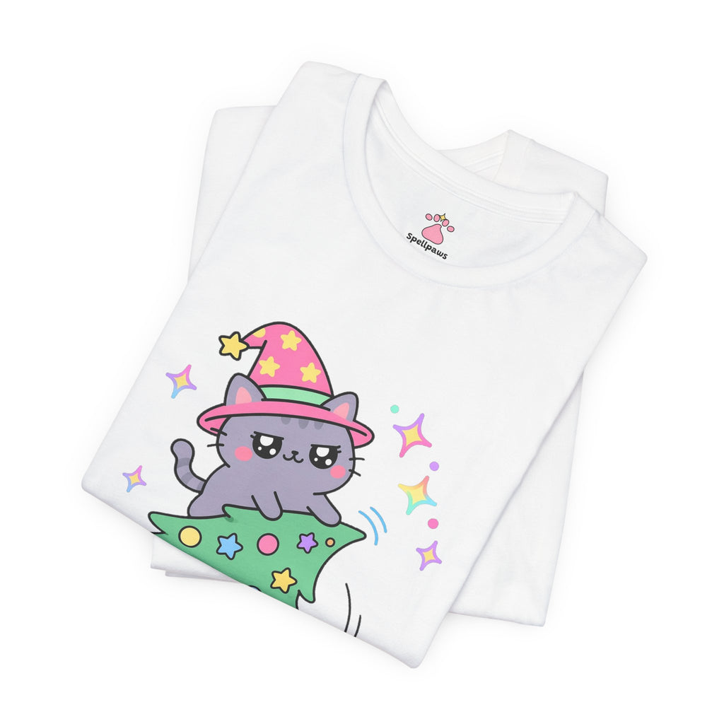 Gray wizard cat in a pink hat climbing to the top of a leaning decorated holiday tree, the star knocked off, Treeus Holidayus Climbus tee