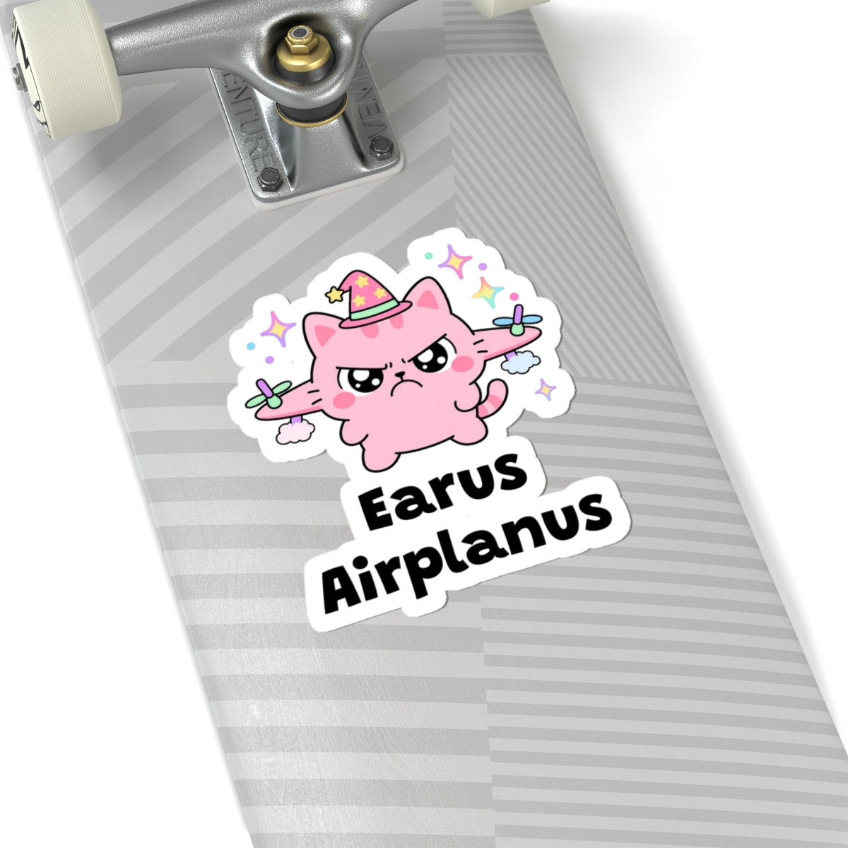 Earus Airplanus wizard cat sticker on a grey skateboard deck near the truck