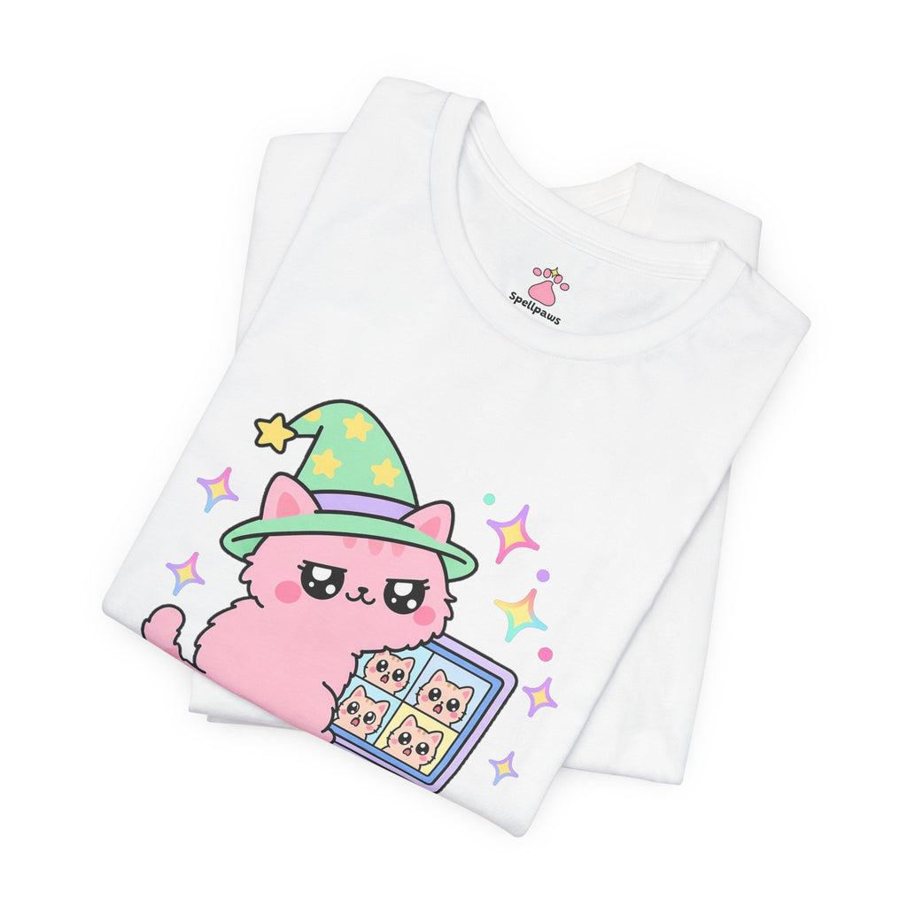Pink wizard cat in a green hat stepping in front of a laptop during a video call with tiny coworker faces on screen, Videous Callus Crashus tee