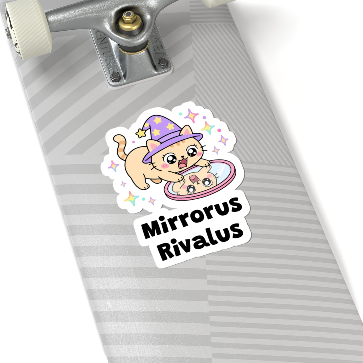 Mirrorus Rivalus wizard cat sticker on a grey skateboard deck near the truck