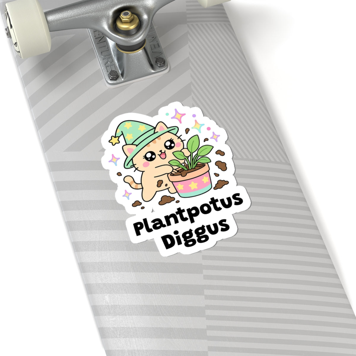 Plantpotus Diggus wizard cat sticker on a grey skateboard deck near the truck