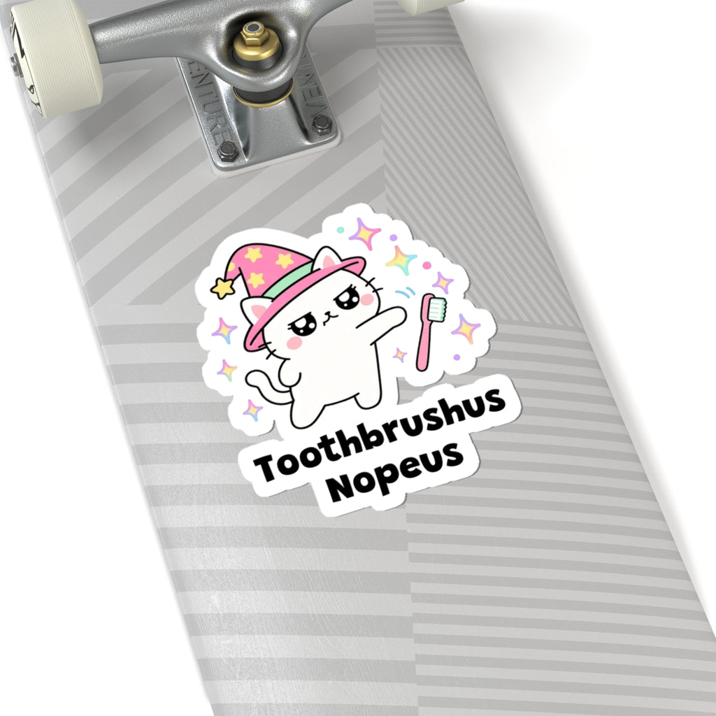 Toothbrushus Nopeus wizard cat sticker on a grey skateboard deck near the truck