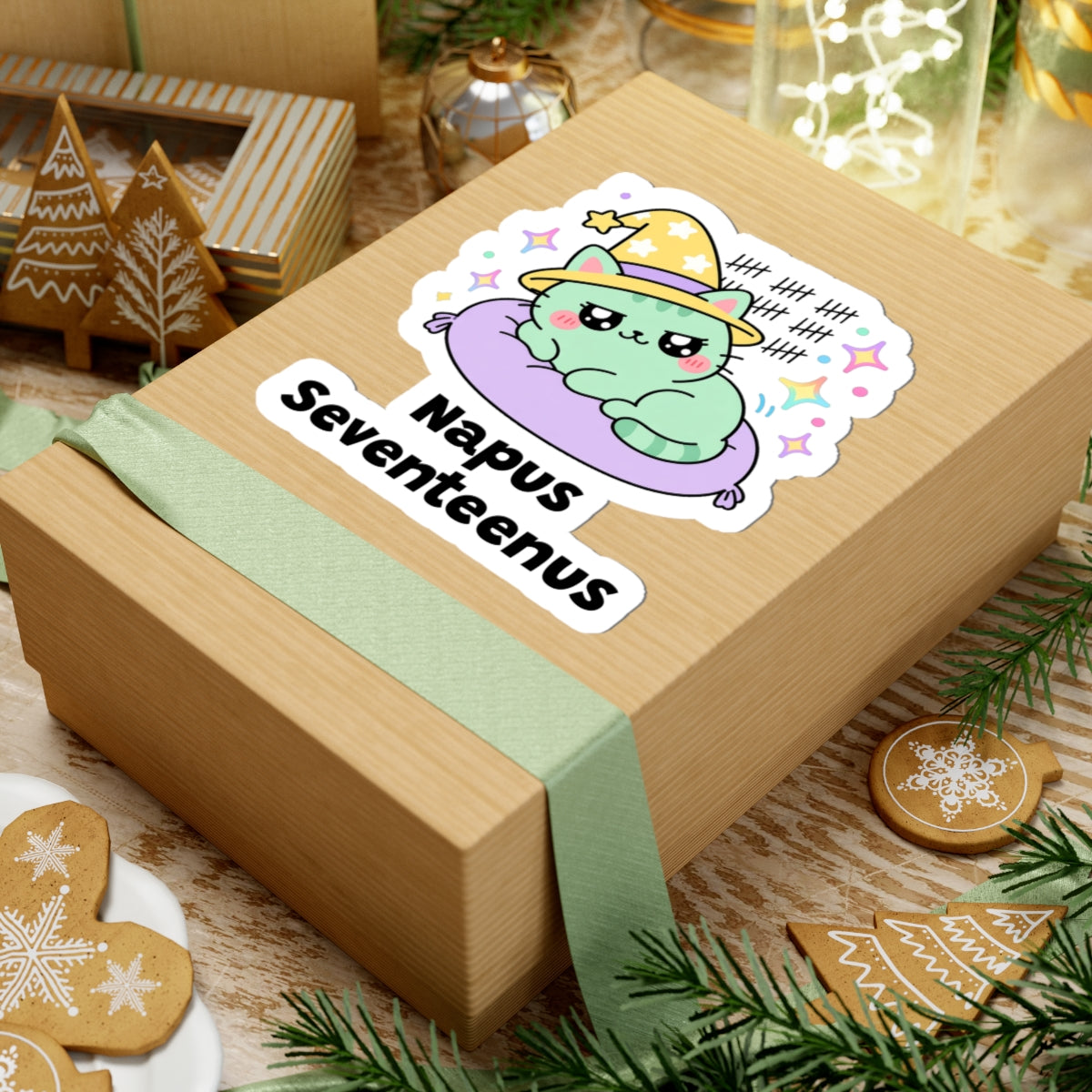 Napus Seventeenus wizard cat sticker on a kraft gift box with a green ribbon and holiday cookies