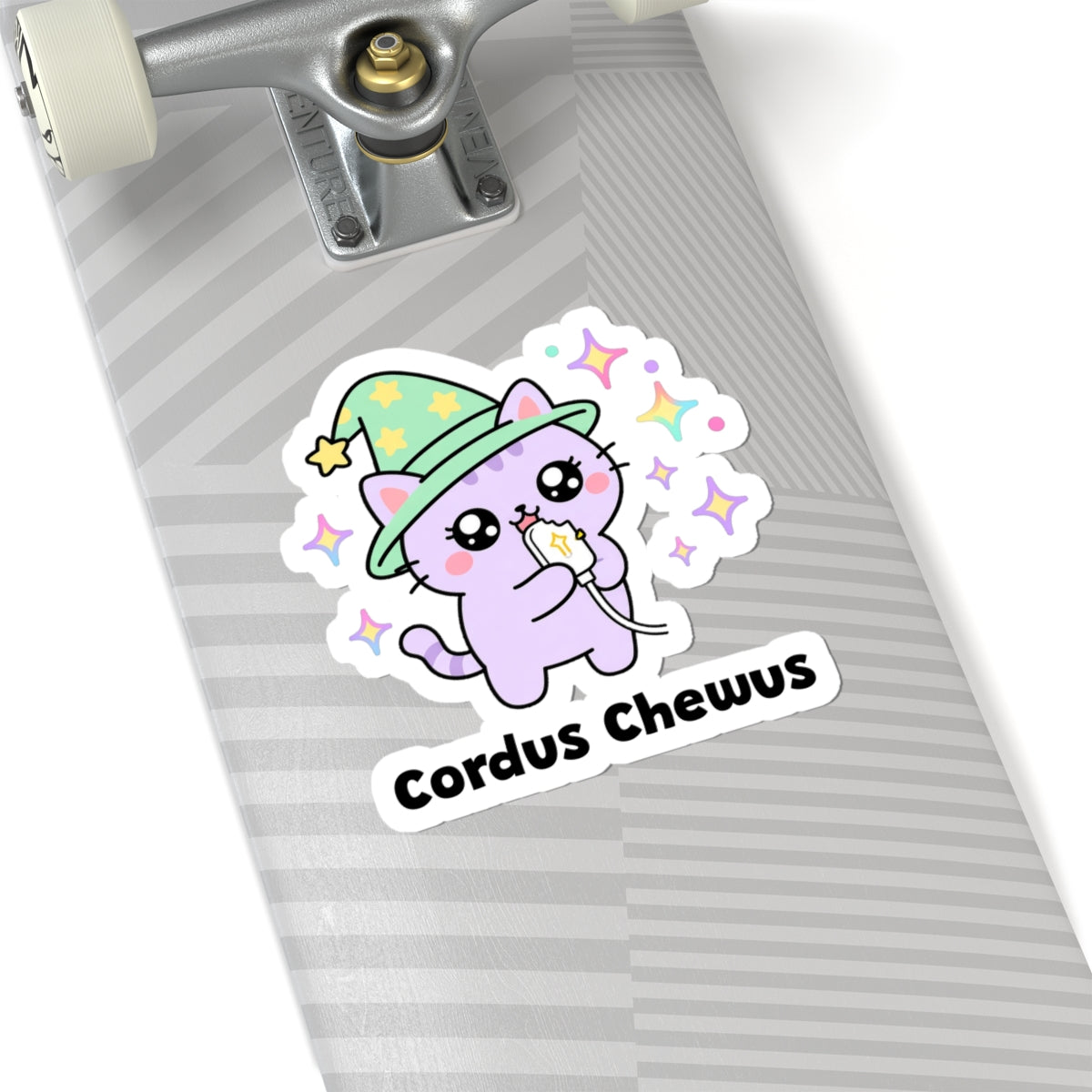 Cordus Chewus wizard cat sticker on a grey skateboard deck near the truck
