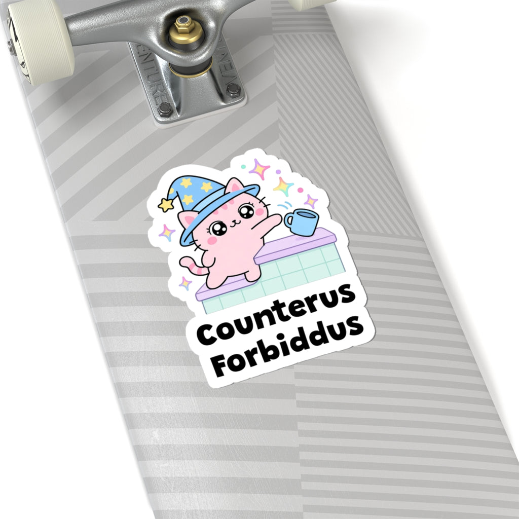 Counterus Forbiddus wizard cat sticker on a grey skateboard deck near the truck
