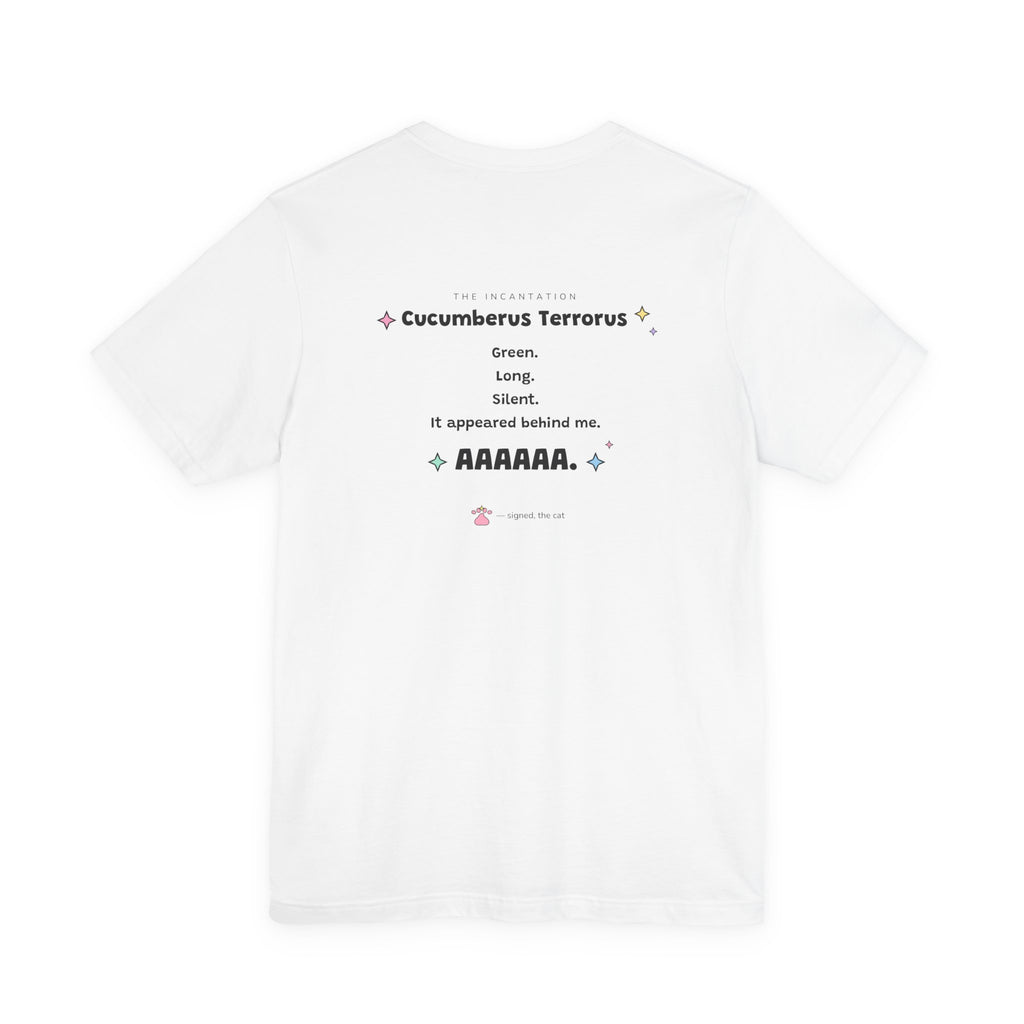 Gray wizard cat in a green hat leaping into the air in fright at a cucumber on the floor, Cucumberus Terrorus tee