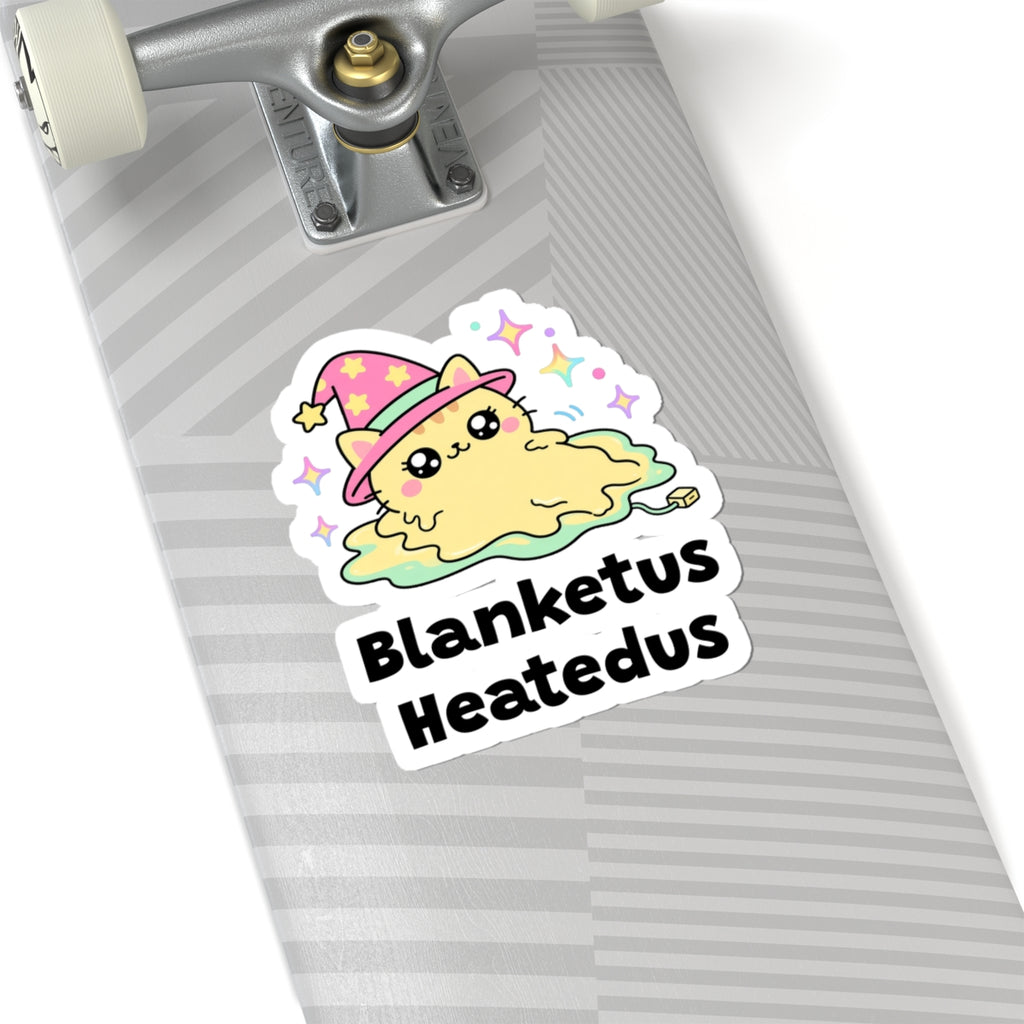 Blanketus Heatedus wizard cat sticker on a grey skateboard deck near the truck