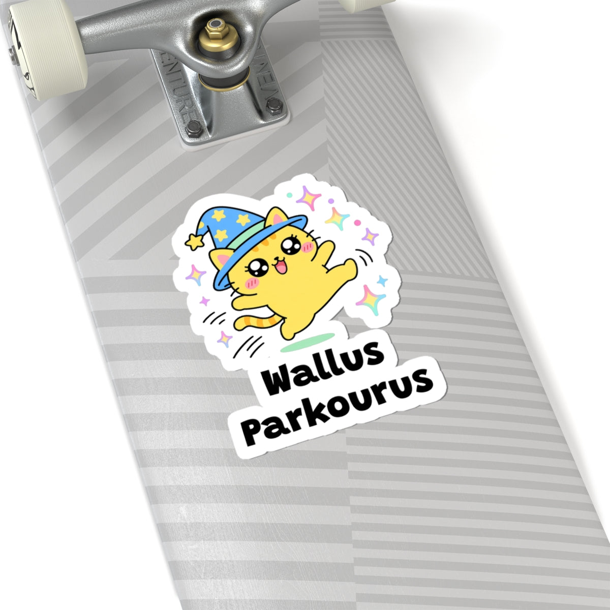 Wallus Parkourus wizard cat sticker on a grey skateboard deck near the truck
