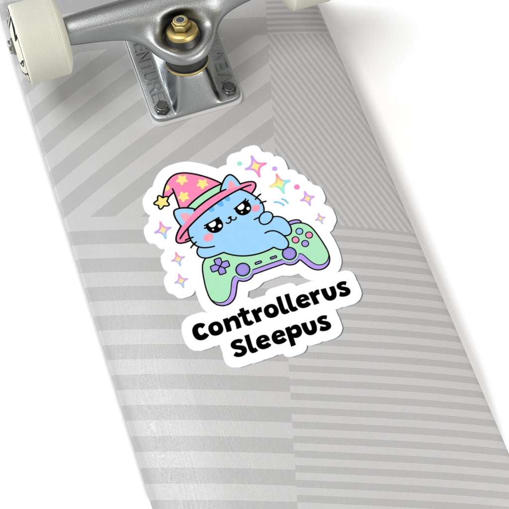 Controllerus Sleepus wizard cat sticker on a grey skateboard deck near the truck