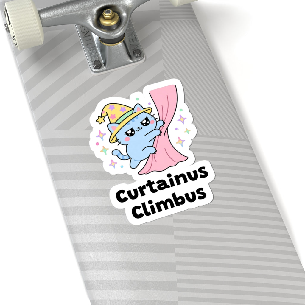 Curtainus Climbus wizard cat sticker on a grey skateboard deck near the truck
